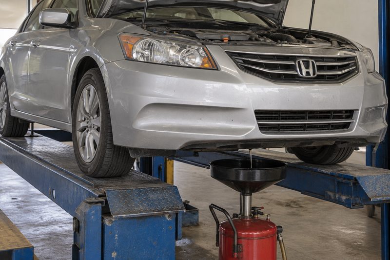 A Honda in the service bay at Dakota Ridge Auto